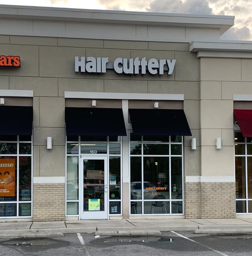 The front entrance of Hair Cuttery at Suffolk Main Street Shoppes.