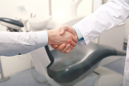 Two people shaking hands