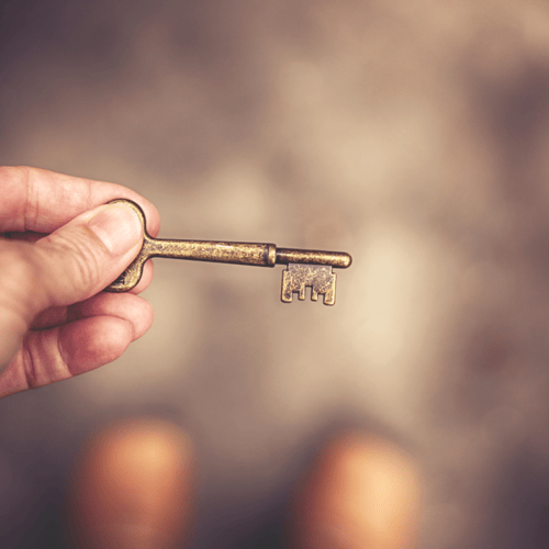 A key being held up.