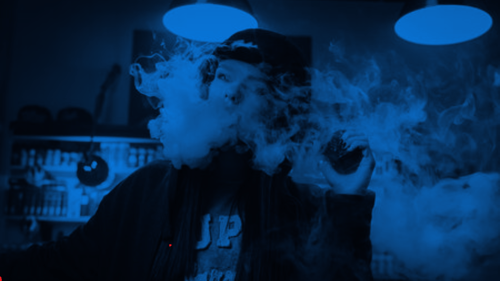 person smoking a vape