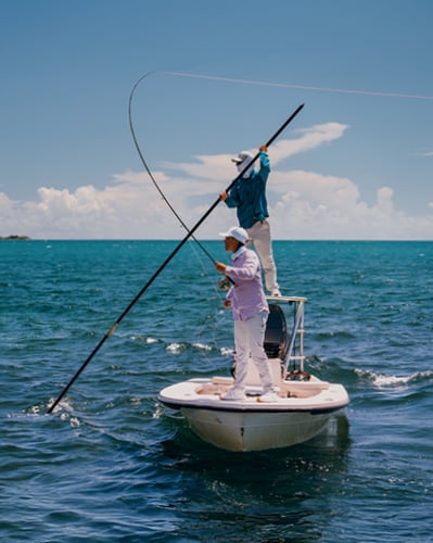 Two people fishing.