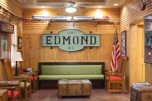 Inside view of the Edmond dental clinic's waiting room with the Edmond signage.