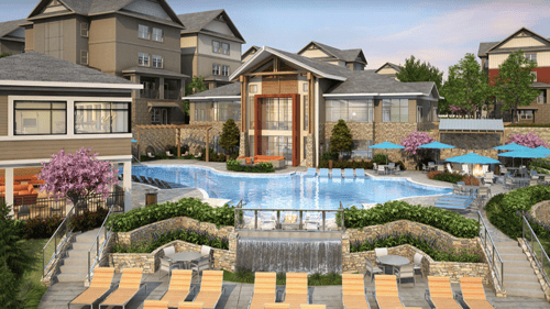 resort style pool with apartments in background, and yellow deck chairs in front