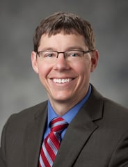 professional portrait of Charles Ahrens, MD