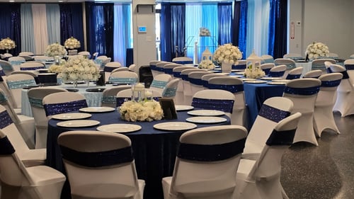 Tables nicely decorated in event venue