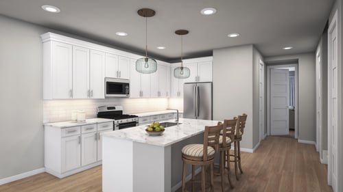 large kitchen with center island and white cabinets