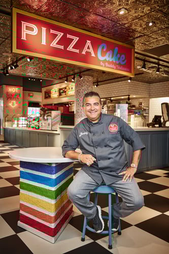 Buddy Valastro in New Orleans opening of Pizza Cake located at Caesars New Orleans Hotel & Casino. Open 7 Days a week at 8 Canal Street. Buddy’s New York-style pizzeria serves a piece of heaven any way you slice it, with options for freshly made pizza or dessert. The new fast-casual concept is located in the Food Hall at Caesars New Orleans. Experience a New York-style pizzeria, with elements of street art, old-school photos, Buddy's personal playlist, classic furnishings, and more. Grab a seat and dig in at the Food Court, or grab your grub to go.