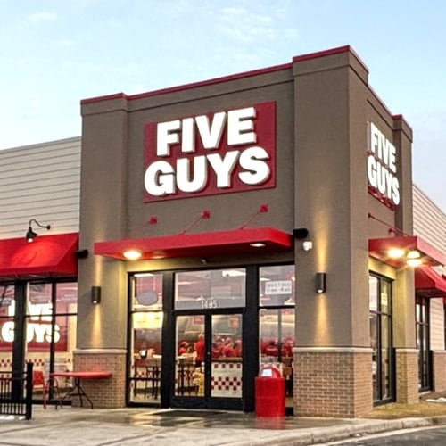 Exterior photograph of the Five Guys restaurant at 1435 Boardman Road in Jackson Michigan.