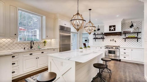 white kitchen with white granite countertops
