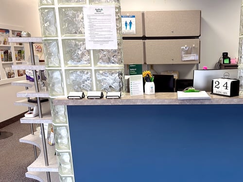Interior photo of the reception desk for AudioNova hearing clinic in Grand Rapids, MI