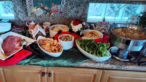 Counter with a full spread of various food items