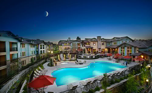View of the community at night at 55+ FountainGlen Jacaranda, Fullerton, CA