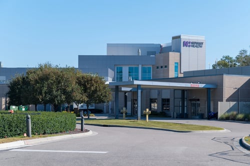 Novant Health Scotts Hill campus exterior and ambulance entrance during the day