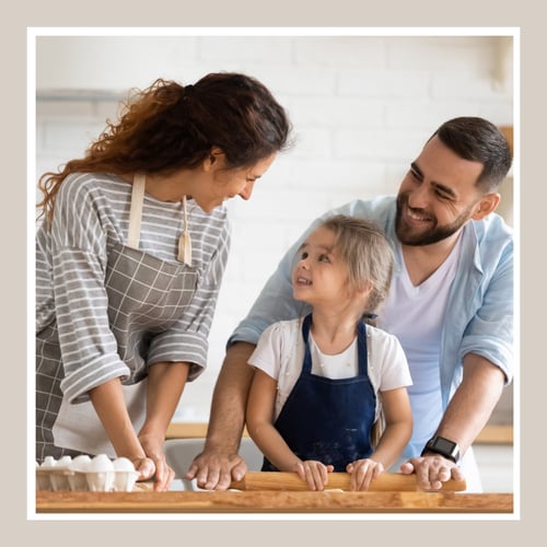 family baking together in the kitchen