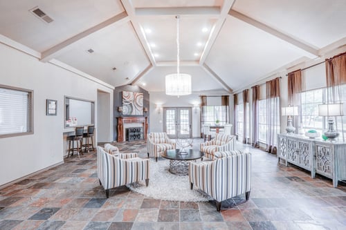 Clubhouse living room with high ceilings at Trinity Square, Dallas, Texas