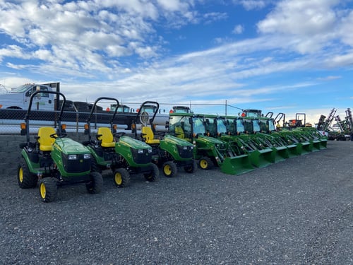 John Deere Utility Tractors parked on the RDO Equipment Co. store lot