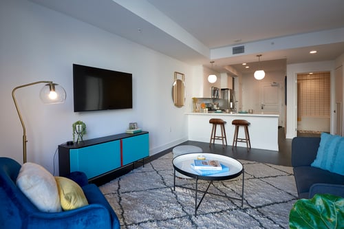 Living room, kitchen and bathroom at Sentral DTLA at 755 S. Spring