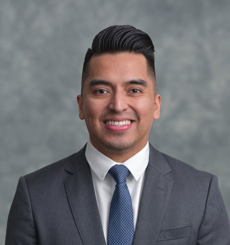 A headshot of Raul Lopez.