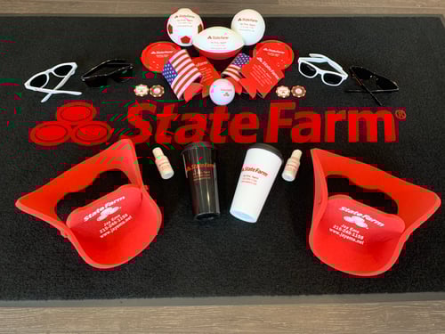 Black State Farm rug with other State Farm goodies