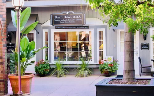 Image of the front of the office with signage.