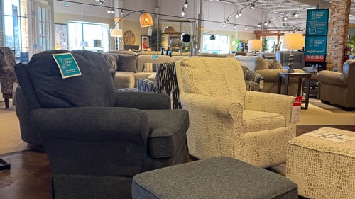 Woodbury Slumberland Furniture matching accent chair and ottoman