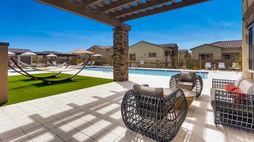 pool deck and sun shade with hammocks at avilla lehi crossing in Mesa, AZ