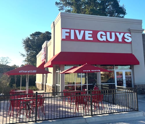 Exterior photograph of the Five Guys restaurant at 602 North Berkley Boulevard in Goldsboro, North Carolina.