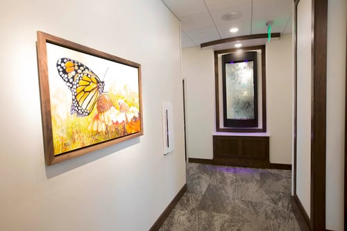 Water feature in the Gathering Place among art and other elements to create an atmosphere of peace and healing.