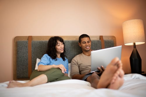 Couple setting up new utilities in their new home