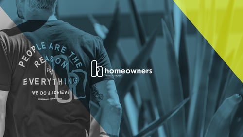 Employee wearing company t-shirt that reads "People are the reason for everything."