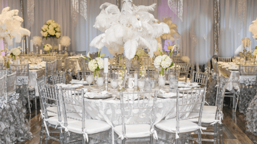 elaborately decorated table and chairs at an event