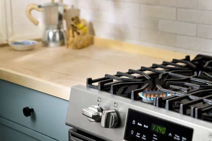 A propane stove, powered on