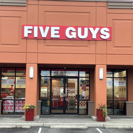 Exterior photograph of the Five Guys restaurant at 755 NW Gilman Boulevard in Issaquah Washington.