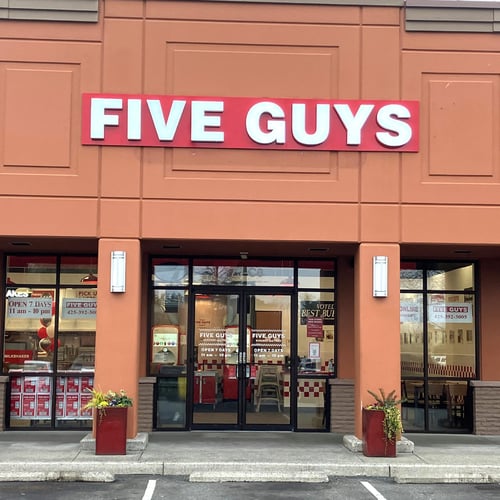 Exterior photograph of the Five Guys restaurant at 755 NW Gilman Boulevard in Issaquah Washington.