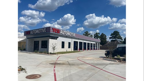 es Automotive building and service center exterior in spring