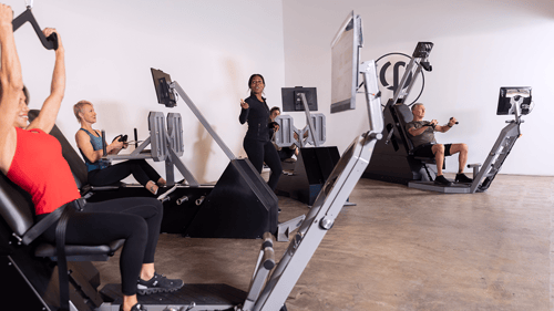 Members working out at a FastFit studio