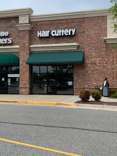 The front entrance of Hair Cuttery at Brenneman Farm.