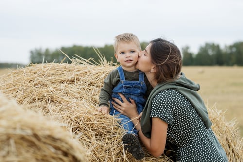 mother and young son on the farm