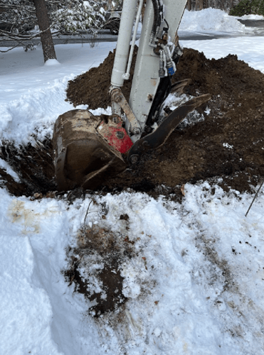 Excavation work in snow