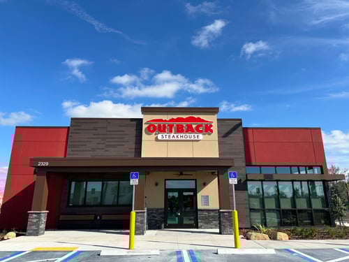 OUTBACK STEAKHOUSE EXTERIOR IMAGE OF CAPE CORAL SKYLINE BOULEVARD LOCATION.