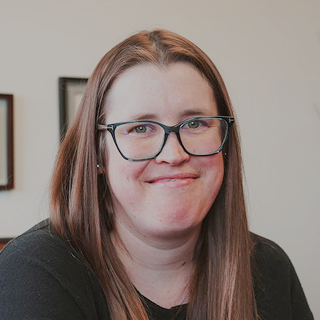 Headshot of Ashton Hogan