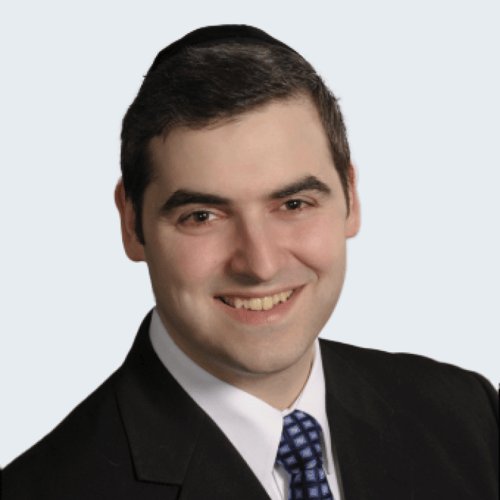 Headshot of Ariel-Charles Guigui