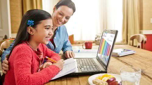 Connections Academy student doing online school work with parent