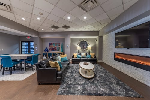 Resident lounge with fireplace at Renaissance at the Power Building, Ohio, 45202