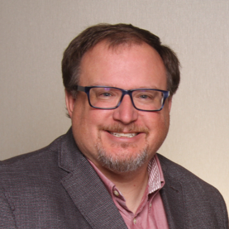 Headshot of Ehren Mendum