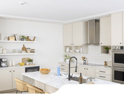 A kitchen with a DETECT smoke alarm by Kidde installed.