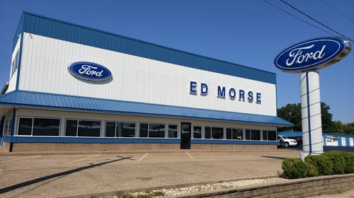 Ed Morse Ford N Geneseo, IL dealership exterior, clear blue sky background