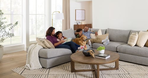 family sitting on their couch