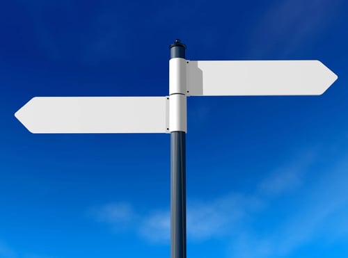 Sign pointing two at two opposite directions