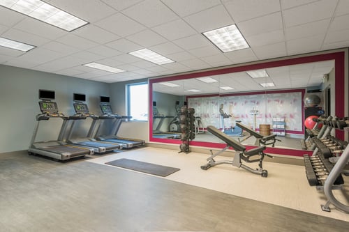Enjoy our 24/7 full-service Fitness Center.